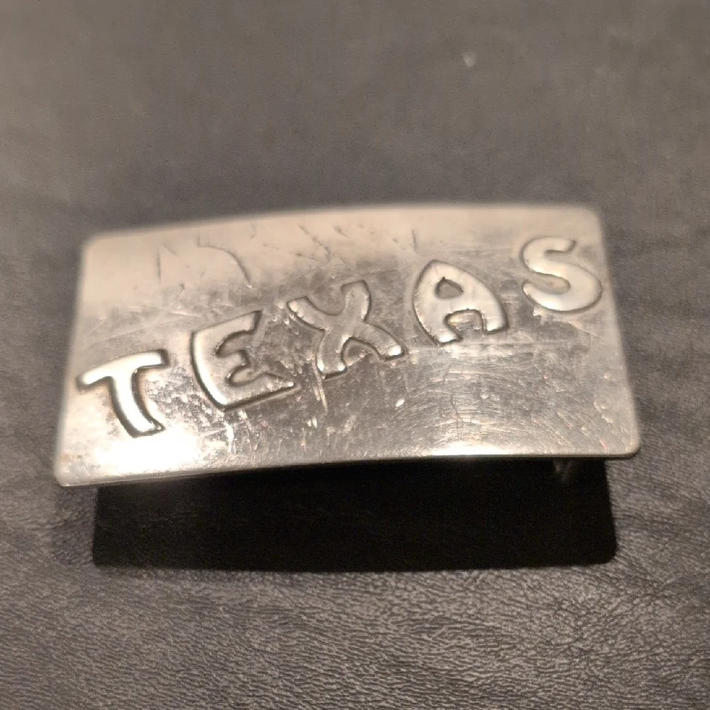 Texas Belt Buckle. Texas In Raised Letters. Priced Low Due To Scratches